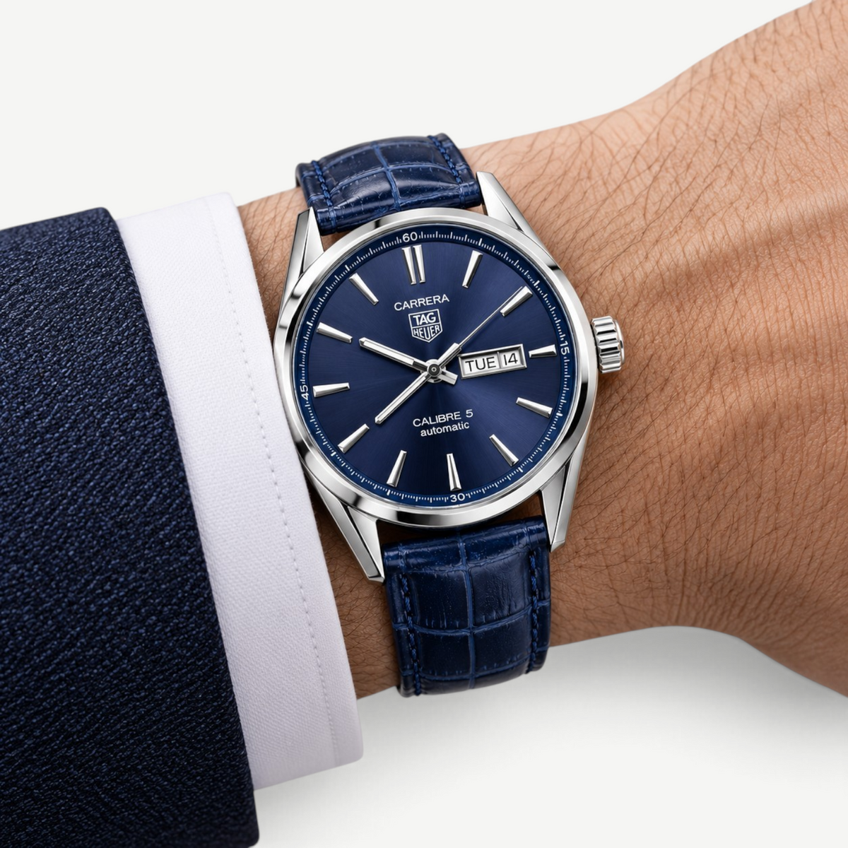 Swankco TAG Heuer Carrera watch with a blue sunray dial, silver indices, and a blue alligator leather strap.